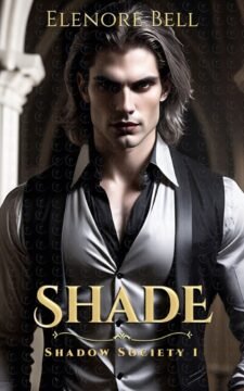Dark-haired man in a black vest and silver gray shirt standing in a shadowy gothic interior.