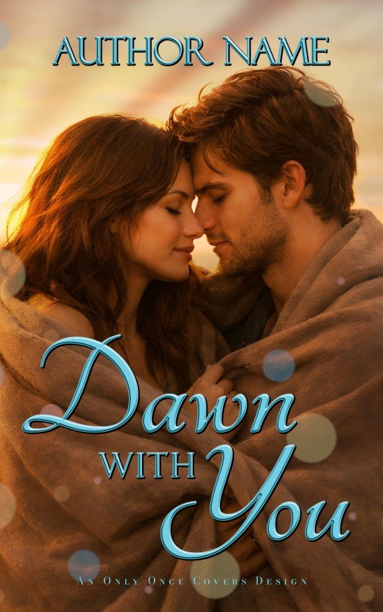 Premade sweet romance book cover featuring a couple wrapped in a blanket at sunrise in warm golden light, intimate embrace with soft bokeh glow.